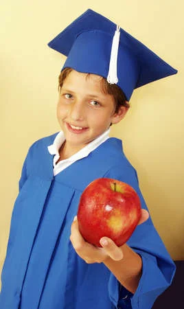 Little kid in graduation gown